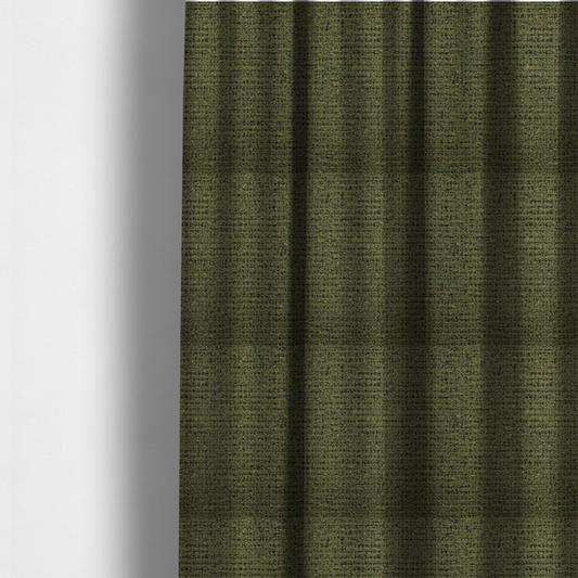the fabric used to create these made-to-measure curtains is a textured, woven fabric featuring a complex pattern of green, dark, and beige threads, creating a speckled and mottled appearance.