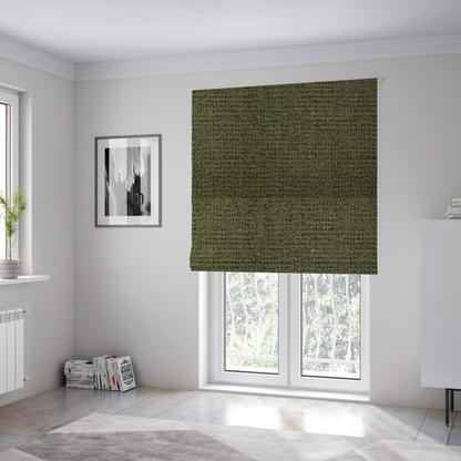 The fabric used to create these Roman blinds is a textured, woven fabric featuring a complex pattern of green, dark, and beige threads, creating a speckled and mottled appearance.