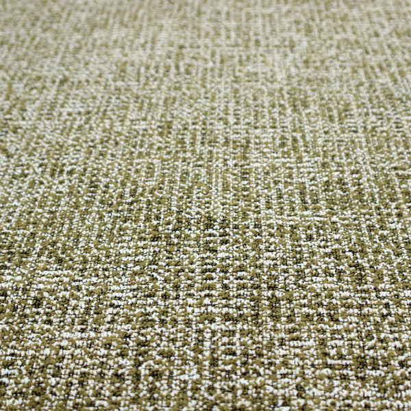 A textured, woven fabric featuring a complex pattern of green, dark, and white threads, creating a speckled and mottled appearance.