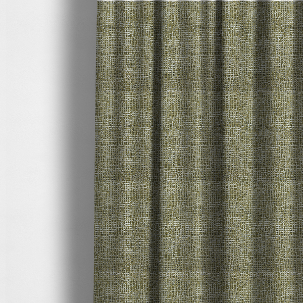 The fabric used to create these made-to-measure curtains is a textured, woven fabric featuring a complex pattern of green, dark, and white threads, creating a speckled and mottled appearance.