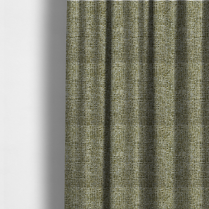 The fabric used to create these made-to-measure curtains is a textured, woven fabric featuring a complex pattern of green, dark, and white threads, creating a speckled and mottled appearance.