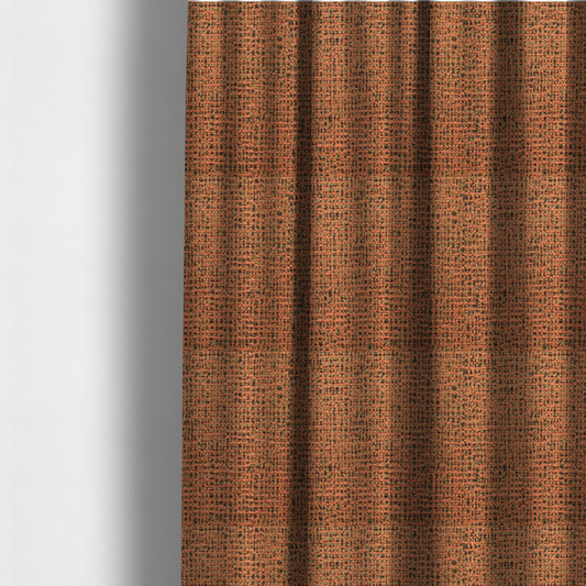 The fabric used to create these made-to-measure curtains is a textured, woven fabric featuring a complex pattern of orange, green, and dark threads, creating a speckled and mottled appearance.