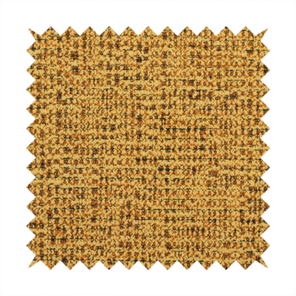 A textured, woven fabric featuring a complex pattern of yellow, dark, and beige threads, creating a speckled and mottled appearance.