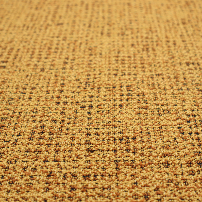 A textured, woven fabric featuring a complex pattern of yellow, dark, and beige threads, creating a speckled and mottled appearance.