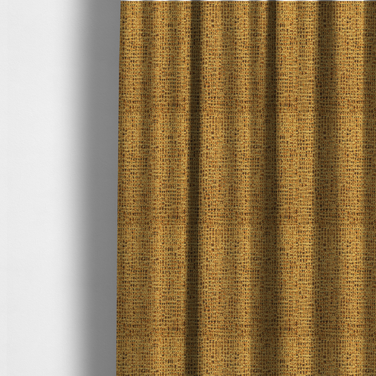 The fabric used to create these made-to-measure curtains is a textured, woven fabric featuring a complex pattern of yellow, dark, and beige threads, creating a speckled and mottled appearance.