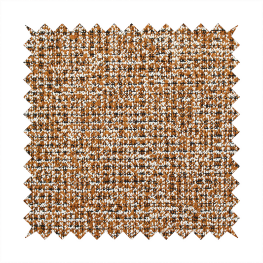 A textured, woven fabric featuring a complex pattern of brown, white, and dark threads, creating a speckled and mottled appearance.