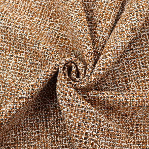 A textured, woven fabric featuring a complex pattern of brown, white, and dark threads, creating a speckled and mottled appearance.