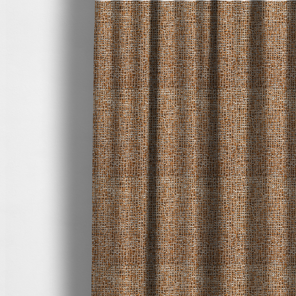 The fabric used to create these made-to-measure curtains is a textured, woven fabric featuring a complex pattern of brown, white, and dark threads, creating a speckled and mottled appearance.