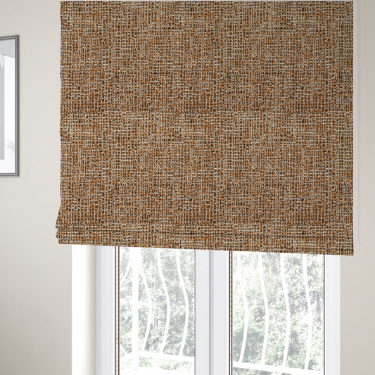 the fabric used to create these Roman blinds is a textured, woven fabric featuring a complex pattern of brown, white, and dark threads, creating a speckled and mottled appearance.