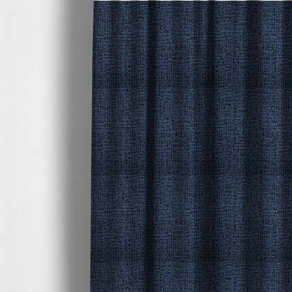 The fabric used to create these made-to-measure curtains is a textured, woven fabric featuring a complex pattern of blue, dark, and navy threads, creating a speckled and mottled appearance.