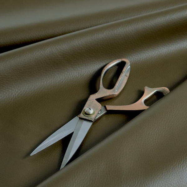 Gorizia Faux Leather Plain Grain Effect In Olive Green Colour Upholstery Fabric CTR-1426