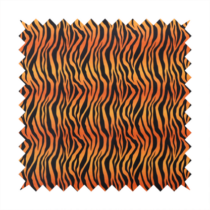 A vibrant, repeating tiger-stripe pattern featuring vertical black wavy stripes over an orange-to-yellow gradient background.