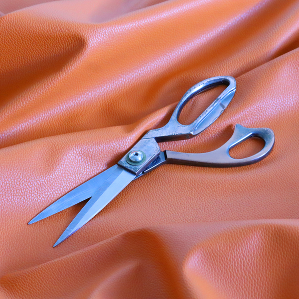 Venosa Plain Faux Leather Look In Orange Colour Upholstery Fabric CTR-1586