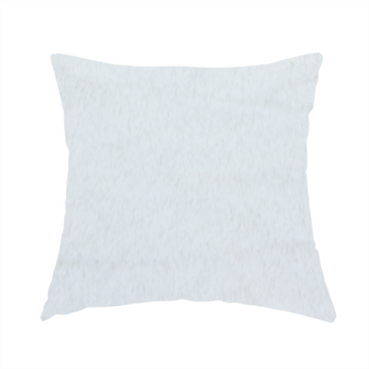 The fabric used to create this handmade cushion is a snow-white faux fur. The material has a dense, soft pile with subtle shadows and highlights that showcase its fluffy, velvety texture.