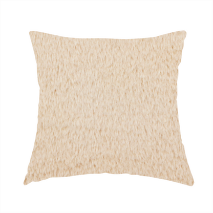 The fabric used to create this handmade cushion is a high-quality faux fur fabric in a warm, sandy beige or light camel hue. The material features a dense, short-pile texture with a soft, uniform grain that gives it a velvety and plush appearance.