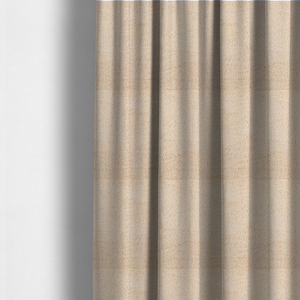 The fabric used to create these made-to-measure curtains is a high-quality faux fur fabric in a warm, sandy beige or light camel hue. The material features a dense, short-pile texture with a soft, uniform grain that gives it a velvety and plush appearance.