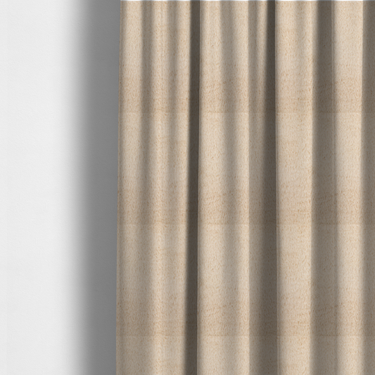 The fabric used to create these made-to-measure curtains is a high-quality faux fur fabric in a warm, sandy beige or light camel hue. The material features a dense, short-pile texture with a soft, uniform grain that gives it a velvety and plush appearance.