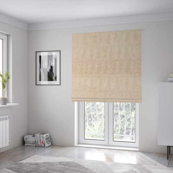 The fabric used to create these Roman blinds is a high-quality faux fur fabric in a warm, sandy beige or light camel hue. The material features a dense, short-pile texture with a soft, uniform grain that gives it a velvety and plush appearance.