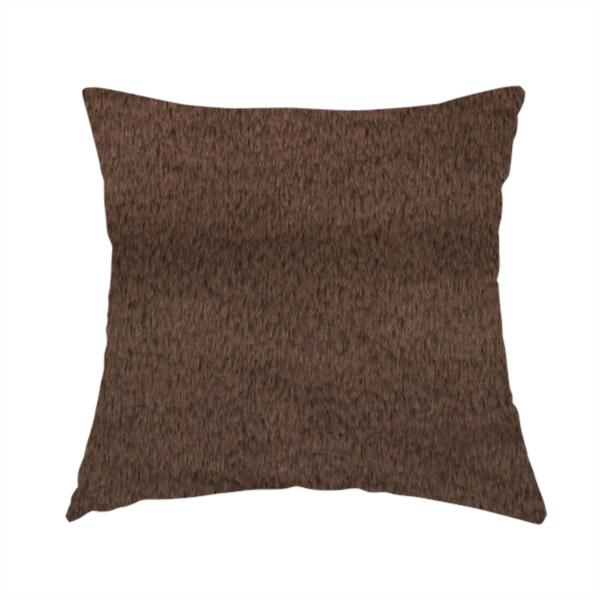 The fabric used to create this handmade cushion is a luxurious faux fur fabric in a deep dark chocolate or espresso brown. The material features a dense, short-pile texture that creates a velvety and sophisticated appearance. The dark, cool-toned brown fibres are tightly packed, offering a soft matte finish with subtle shadows that highlight the fabric's thick and plush quality.