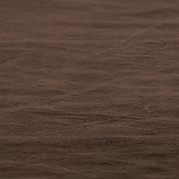 A luxurious faux fur fabric in a deep dark chocolate or espresso brown. The material features a dense, short-pile texture that creates a velvety and sophisticated appearance. The dark, cool-toned brown fibres are tightly packed, offering a soft matte finish with subtle shadows that highlight the fabric's thick and plush quality.