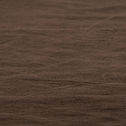 A luxurious faux fur fabric in a deep dark chocolate or espresso brown. The material features a dense, short-pile texture that creates a velvety and sophisticated appearance. The dark, cool-toned brown fibres are tightly packed, offering a soft matte finish with subtle shadows that highlight the fabric's thick and plush quality.