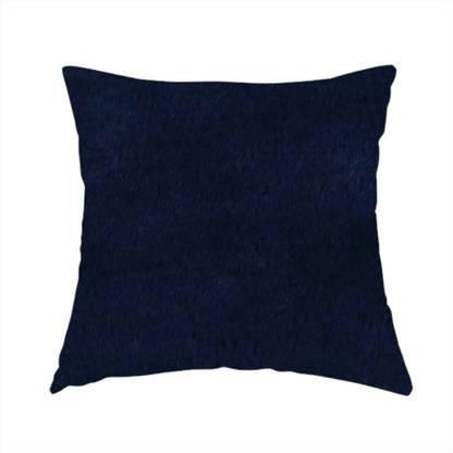The fabric used to create this handmade cushion is a plush faux fur fabric in a deep, classic navy blue. The material features a dense, short-pile texture that creates a rich, velvety surface with a sophisticated matte finish. The tightly packed dark blue fibres catch the light to show subtle tonal depth and soft shadows, suggesting an exceptionally soft and luxurious hand-feel.