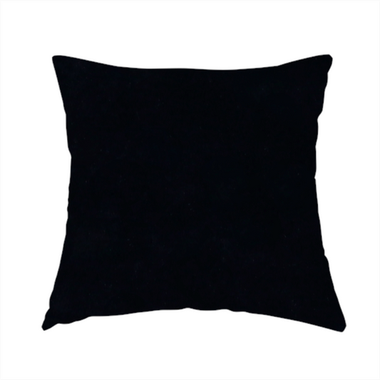 The fabric used to create this handmade cushion is a luxurious faux fur fabric in a solid, true jet black. The material showcases an exceptionally dense, short-pile texture with a soft, uniform grain that creates a deep matte finish. Because of its high density, the fabric absorbs light significantly, resulting in a rich, velvety appearance with minimal sheen.