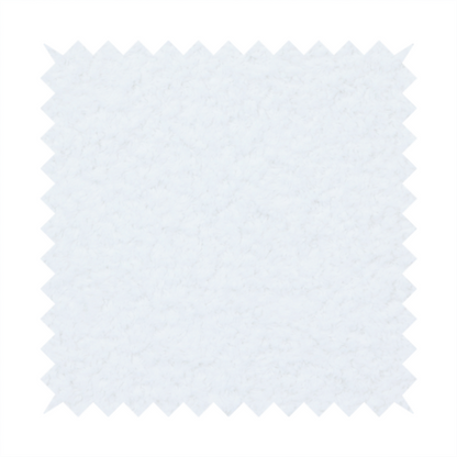 This fabric features a high-pile, textured surface that mimics the cosy appearance of shearling or faux sheepskin.