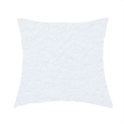 The fabric used to create this handmade cushion features a high-pile, textured surface that mimics the cosy appearance of shearling or faux sheepskin.