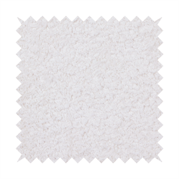 This fabric features a high-pile faux fur texture that provides a lush, tactile experience with a soft and cosy aesthetic.