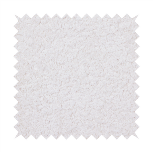 This fabric features a high-pile faux fur texture that provides a lush, tactile experience with a soft and cosy aesthetic.