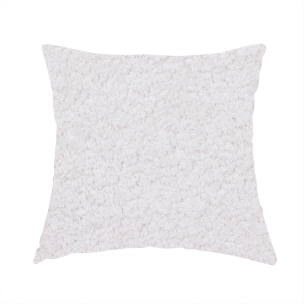 The fabric used to create this handmade cushion features a high-pile faux fur texture that provides a lush, tactile experience with a soft and cosy aesthetic.