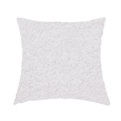 The fabric used to create this handmade cushion features a high-pile faux fur texture that provides a lush, tactile experience with a soft and cosy aesthetic.