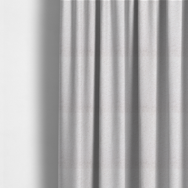 The fabric used to create these made-to-measure curtains features a high-pile faux fur texture that provides a lush, tactile experience with a soft and cosy aesthetic.