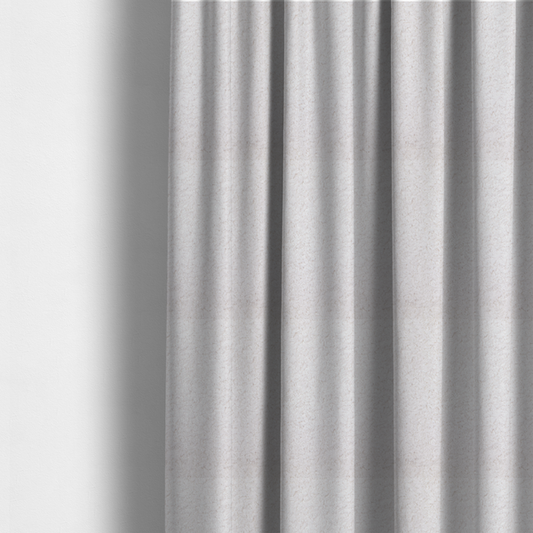 The fabric used to create these made-to-measure curtains features a high-pile faux fur texture that provides a lush, tactile experience with a soft and cosy aesthetic.