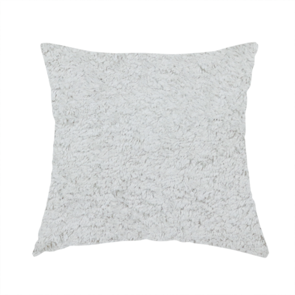 The fabric used to create this handmade cushion features a high-pile faux fur texture that offers a cool-toned, plush aesthetic with a rich tactile quality.