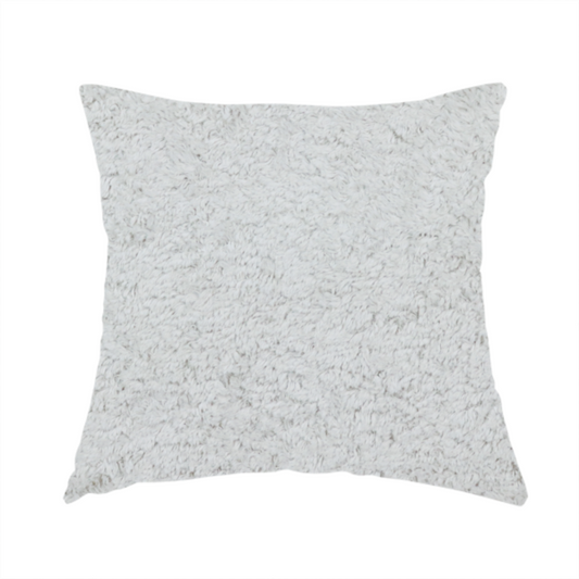 The fabric used to create this handmade cushion features a high-pile faux fur texture that offers a cool-toned, plush aesthetic with a rich tactile quality.