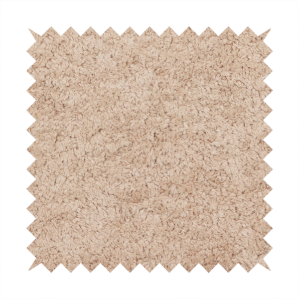 This fabric features a high-pile faux fur texture that offers a warm, inviting aesthetic with a soft and tactile quality.