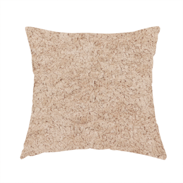 The fabric used to create these handmade cushions features a high-pile faux fur texture that offers a warm, inviting aesthetic with a soft and tactile quality.