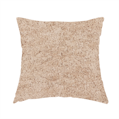 The fabric used to create these handmade cushions features a high-pile faux fur texture that offers a warm, inviting aesthetic with a soft and tactile quality.