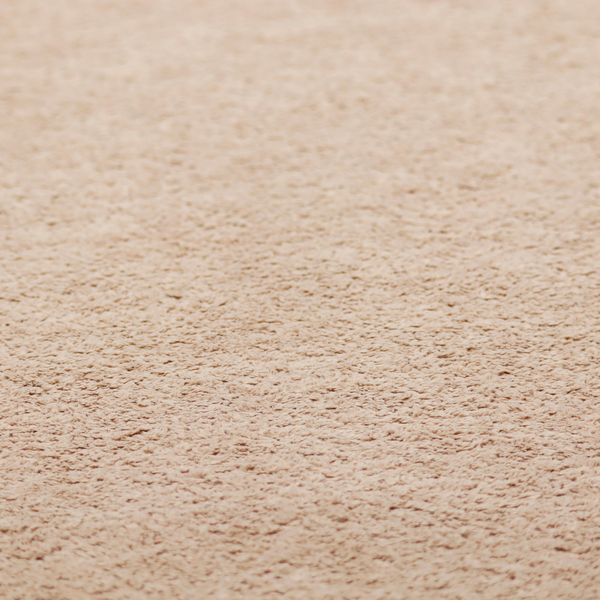 This fabric features a high-pile faux fur texture that offers a warm, inviting aesthetic with a soft and tactile quality.