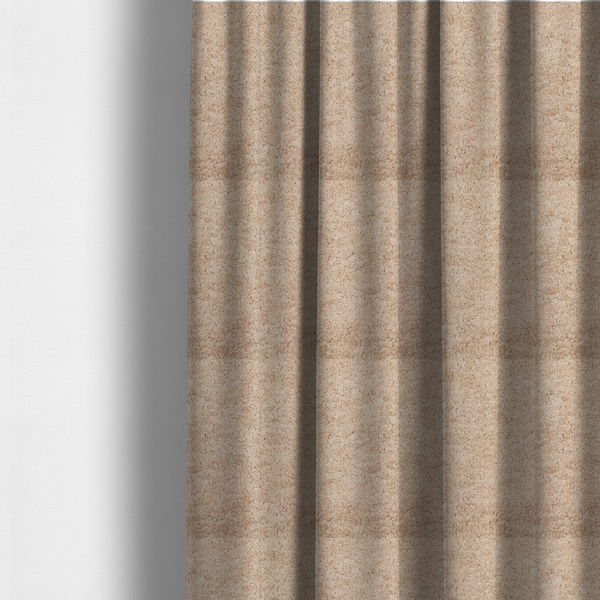 The fabric used to create these made-to-measure curtains features a high-pile faux fur texture that offers a warm, inviting aesthetic with a soft and tactile quality.