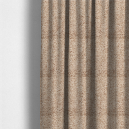 The fabric used to create these made-to-measure curtains features a high-pile faux fur texture that offers a warm, inviting aesthetic with a soft and tactile quality.