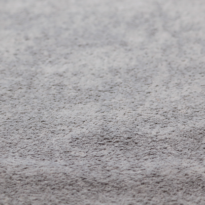 This fabric features a high-pile faux fur texture that offers a sophisticated, cool-neutral aesthetic with a soft and tactile quality.