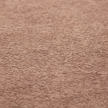 This fabric features a high-pile faux fur texture that provides a warm, sophisticated aesthetic with a rich tactile quality.