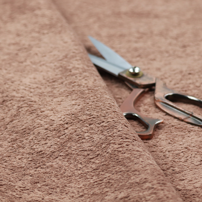 This fabric features a high-pile faux fur texture that provides a warm, sophisticated aesthetic with a rich tactile quality.