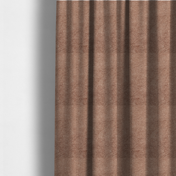 The fabric used to create these made-to-measure curtains features a high-pile faux fur texture that provides a warm, sophisticated aesthetic with a rich tactile quality.