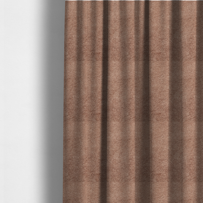 The fabric used to create these made-to-measure curtains features a high-pile faux fur texture that provides a warm, sophisticated aesthetic with a rich tactile quality.