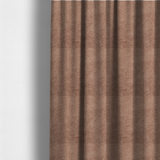 The fabric used to create these made-to-measure curtains features a high-pile faux fur texture that provides a warm, sophisticated aesthetic with a rich tactile quality.
