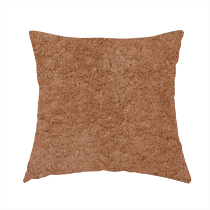 The fabric used to create this handmade cushion features a high-pile faux fur texture that provides a rich, earthy aesthetic with a soft and plush tactile quality.